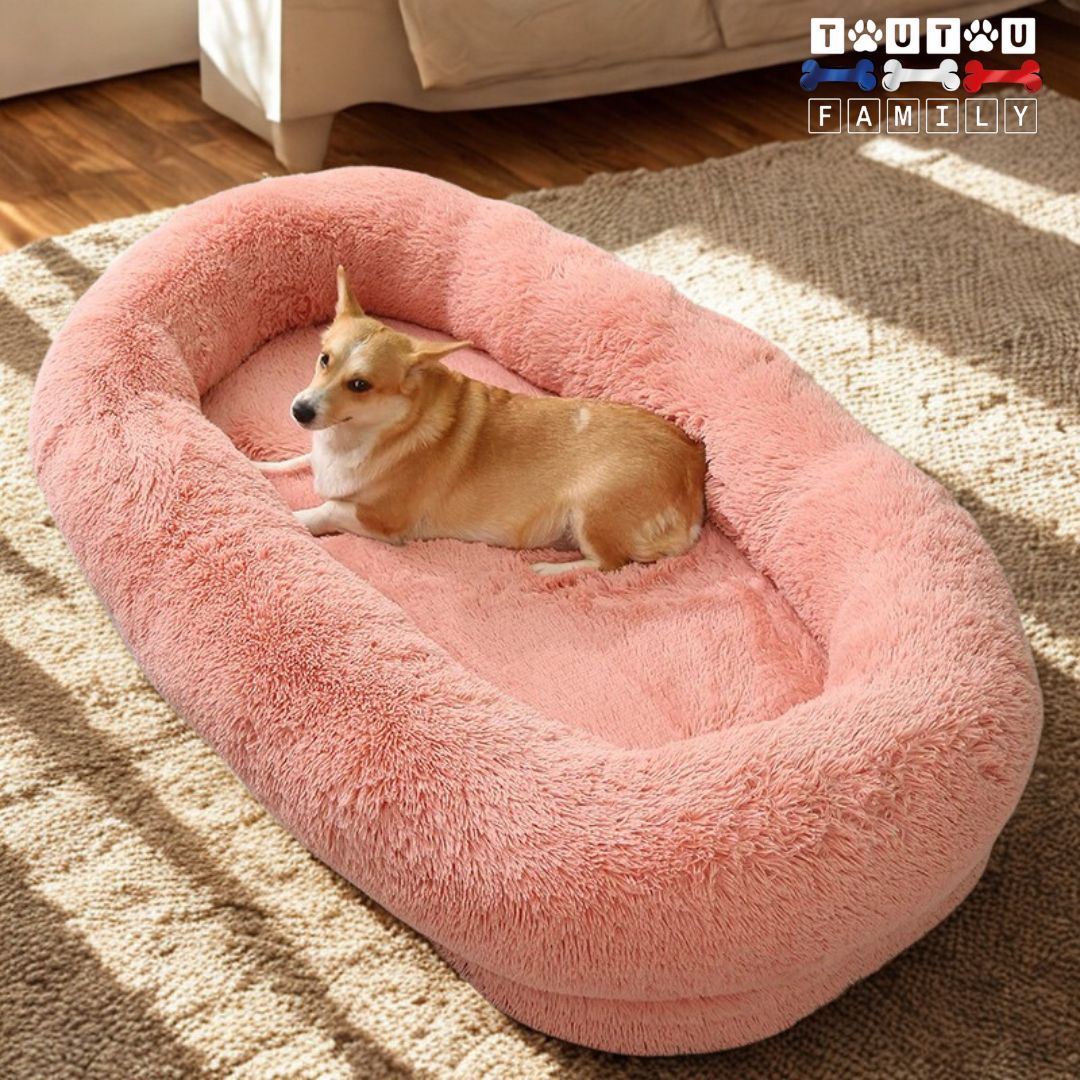 Lit-chien-xxl-rose pour très grand chien déhoussable lavable antidérapant imperméable et lavable en machine comme un coussin ovale en peluche avec rebord entourant-traversin 360° 100% coton