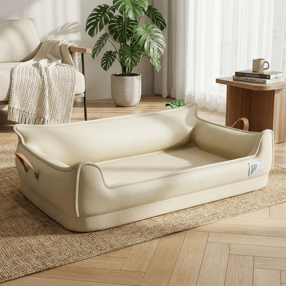 Panier-orthopedique-chien-simili-cuir-imperméable, déhoussable, antidérapant et lavable avec deux poignée de transport, ne retient pas les poils, avec dossier et rebord surélevé, résistant aux griffes en cuir végan et matelas haute résilience à mémoire de forme en coton PP, design moderne et soigné avec coutures solides pour chiot et chien de petite à moyenne taille-de couleur beige, fond antidérapant, panier anti-stress pour chien