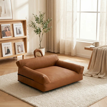 Petit-canapé-pour-chien-chiot-imperméable, déhoussable lavable en machine, en Cuir végan et rembourrage 100% coton haute densité et résilience, avec accoudoirs, dossier et assise ergonomique, avec poignée de transport, antidérapant et anti humidité, durable solide et résistant aux griffes pour chiot, petit chien et race naine de 0 à 10 kilos- design vintage chic de couleur marron, épais avec finitions soignées et solides