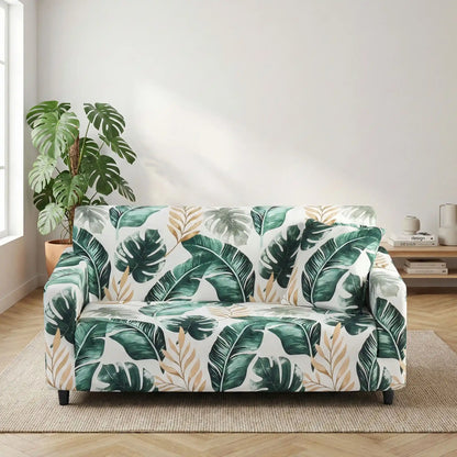 Protection-canape-chien-anti-poils-anti accident, lavable en machine, haute élasticité et resistante aux griffes et à l'usure, universelle en 4 tailles pour fauteuil, canapé de 2/3/4 places, avec élastique et bloque plis-modèle avec feuilles dorées et verte sur fond blanc, très fin et soignés sur un canapé 3 place deans le salon de l'appartement