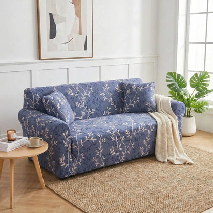 Protection-canape-chien-anti-poils-anti accident, lavable en machine, haute élasticité et resistante aux griffes et à l'usure, universelle en 4 tailles pour fauteuil, canapé de 2/3/4 places, avec élastique et bloque plis- design floral délicat- photo du modèle bleu au motif délicat sur le canapé du salon du loft